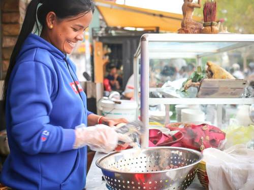 Phnom Penh Food Tour Vendor Smiles
