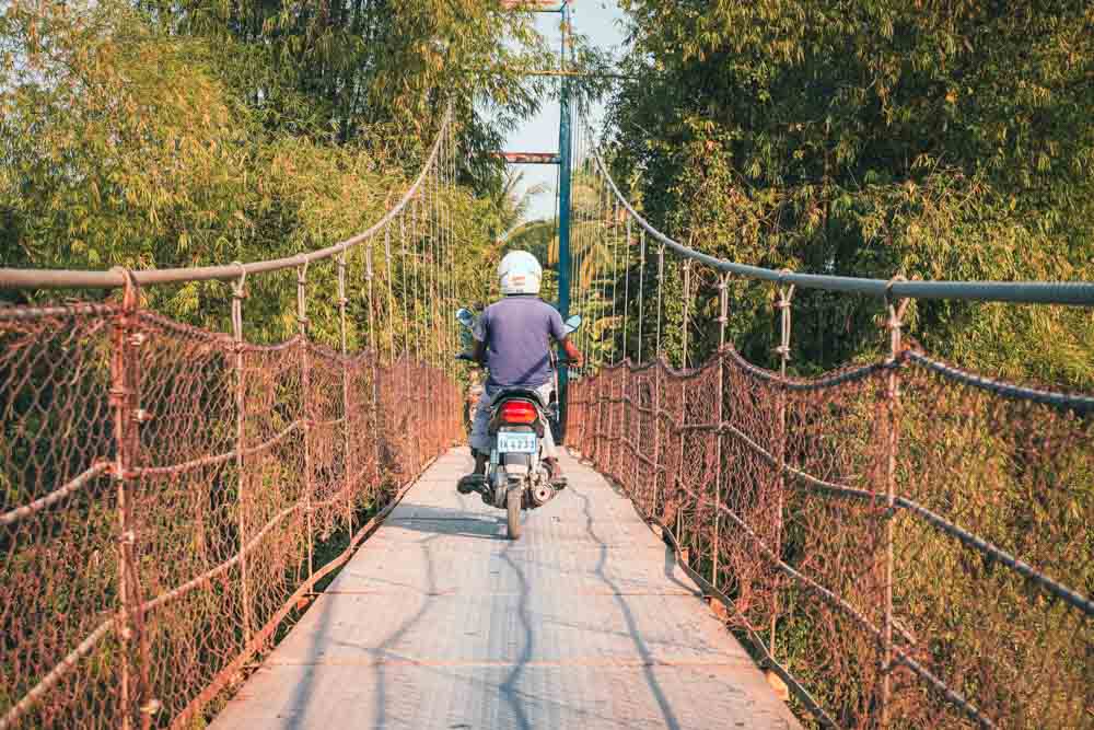 Discover Authentic Cambodia Multi-Day Trip Battambang Bridge Moto