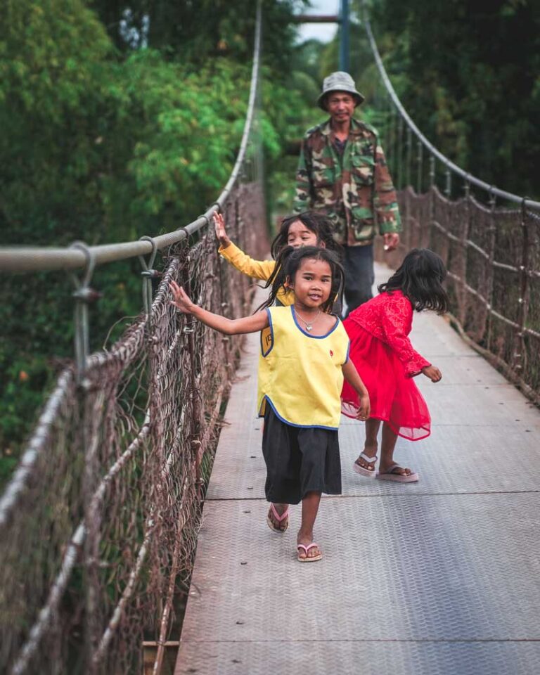 Cambodian children on a bridge