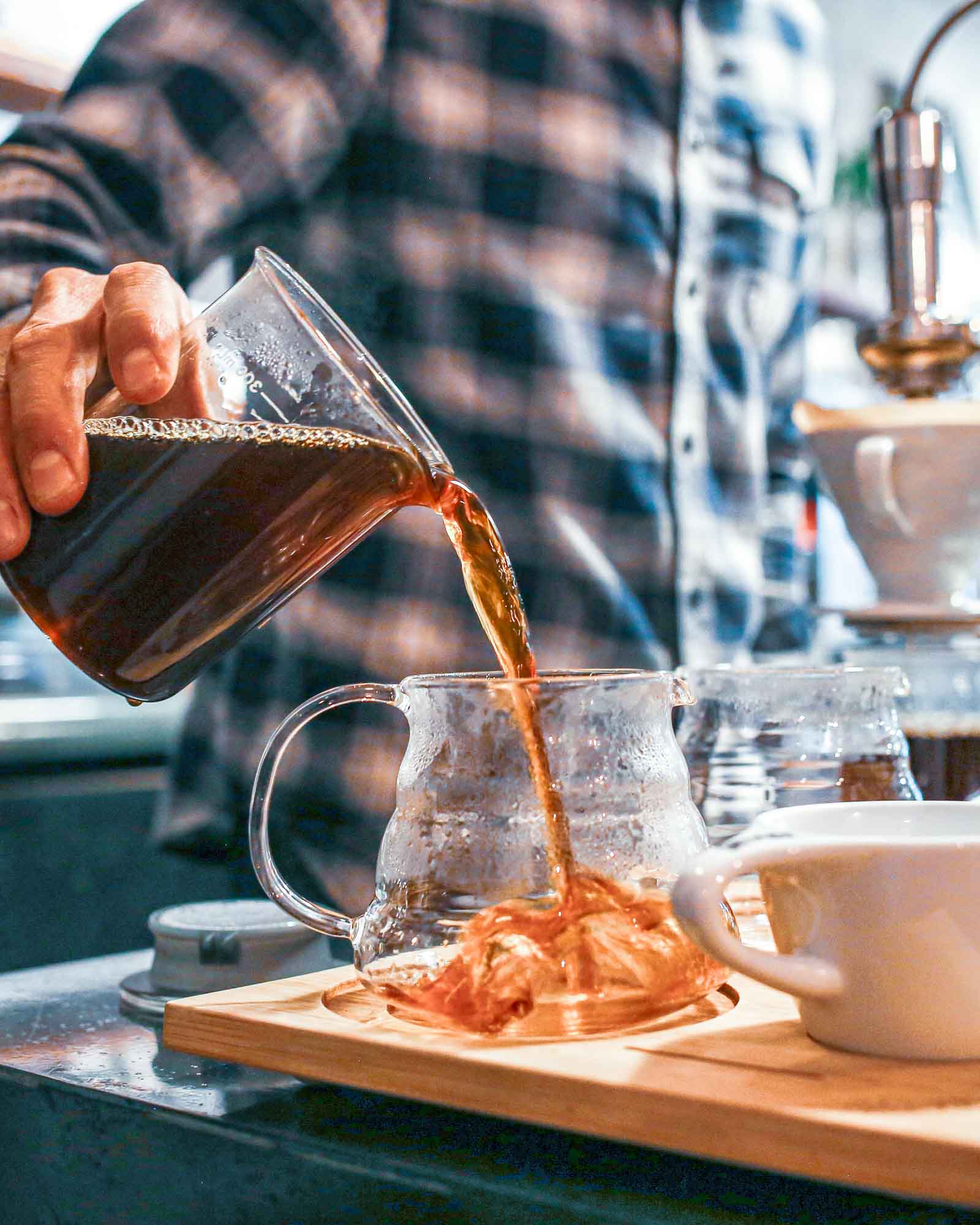 A specialty pour-over coffee being poured