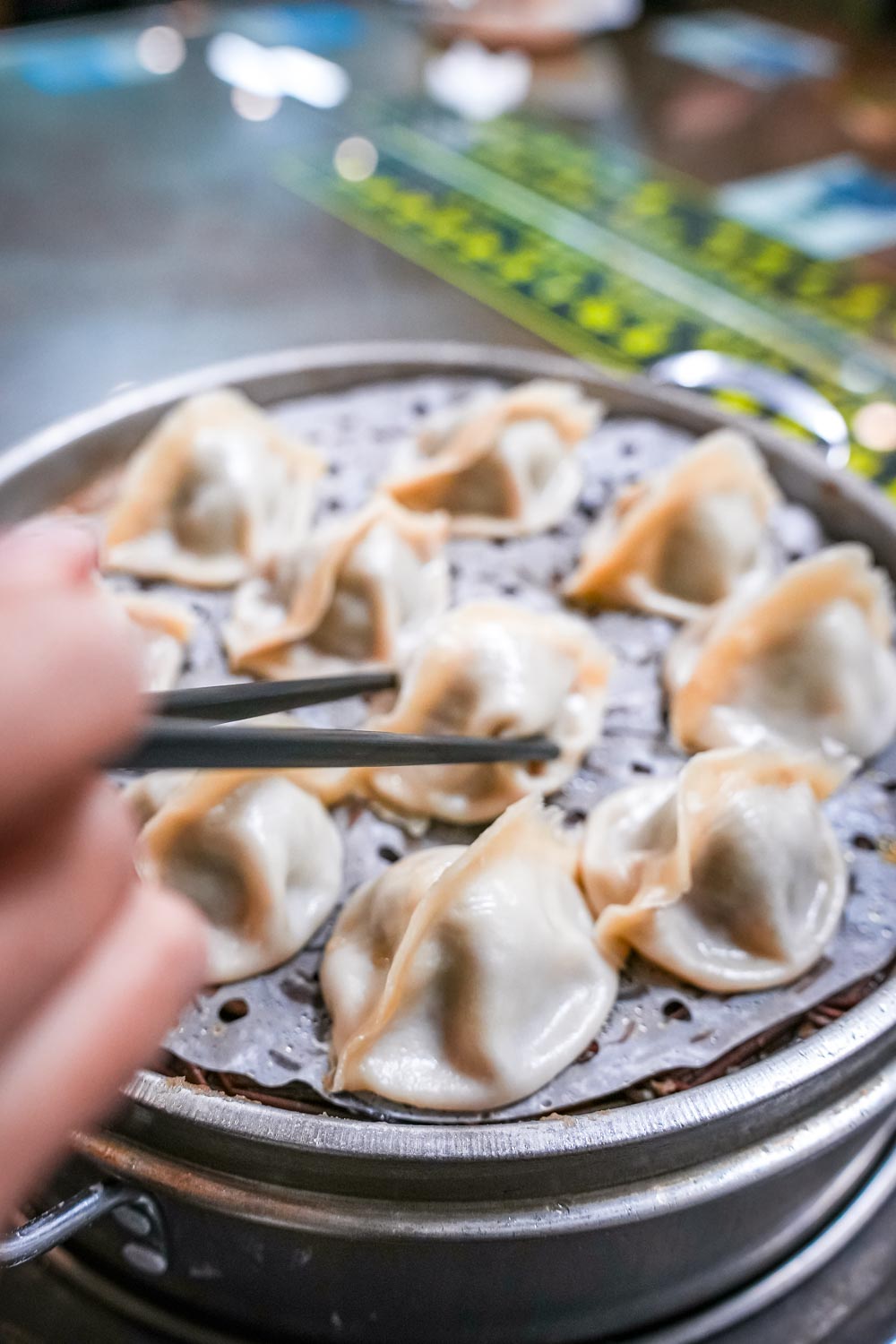 Guest eating soup dumplings