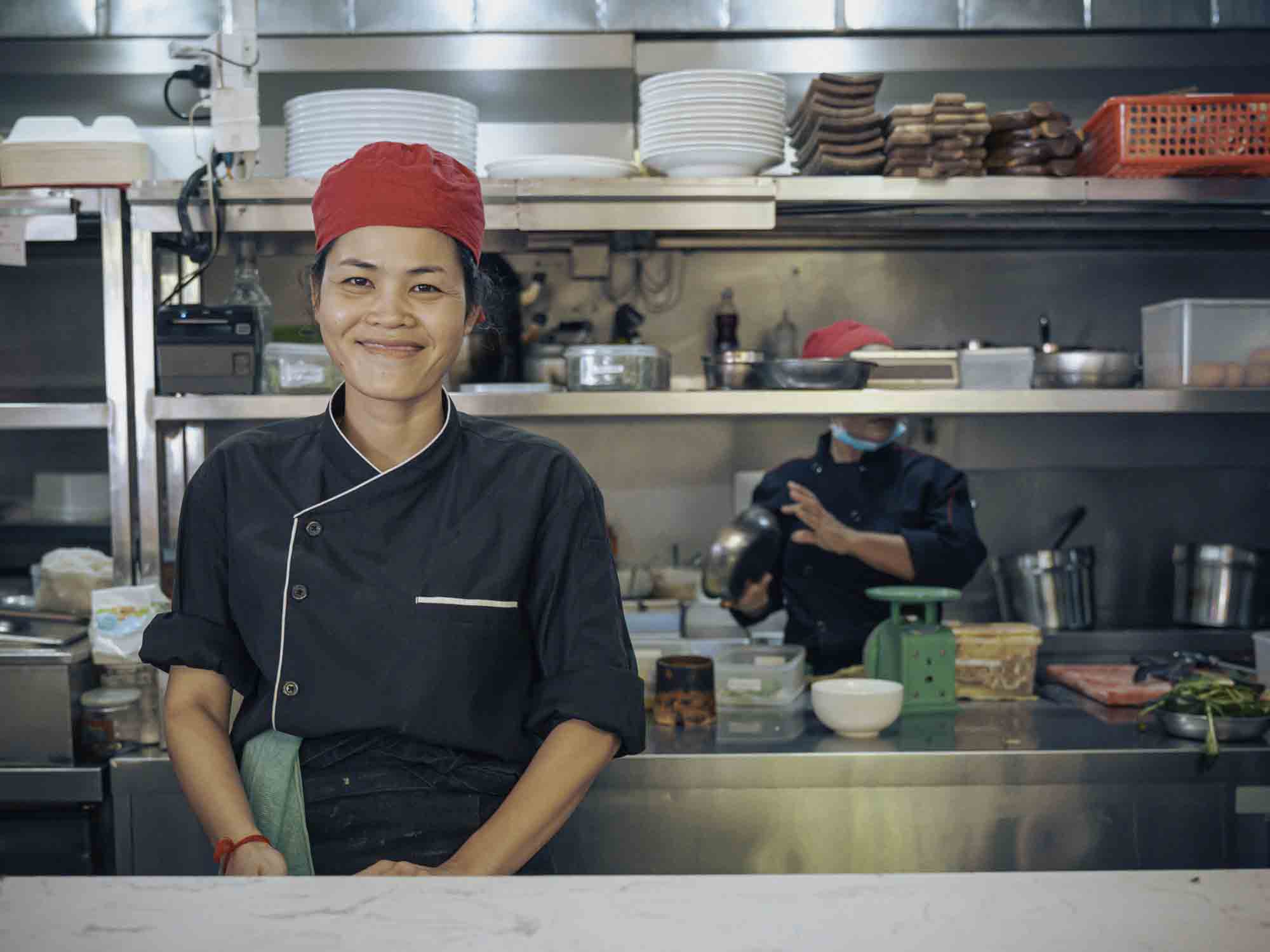 Smiling Chef in Kitchen