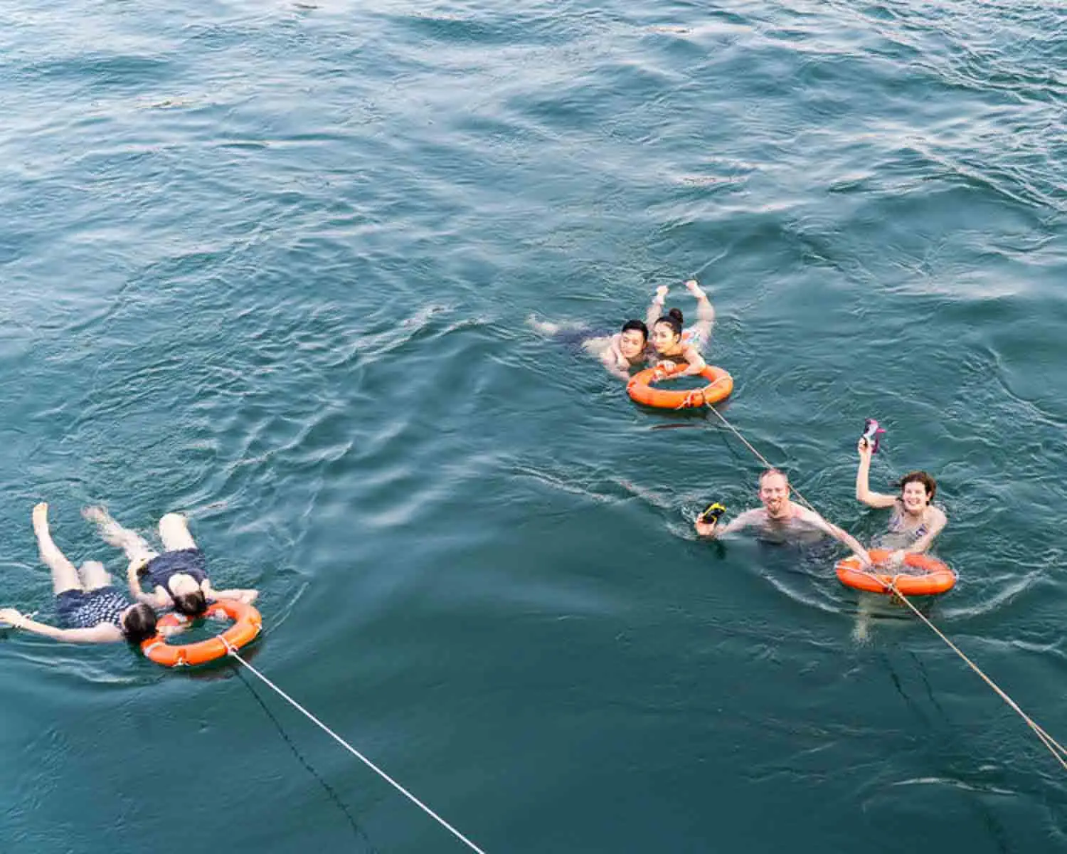 Guests swimming in Halong Bay