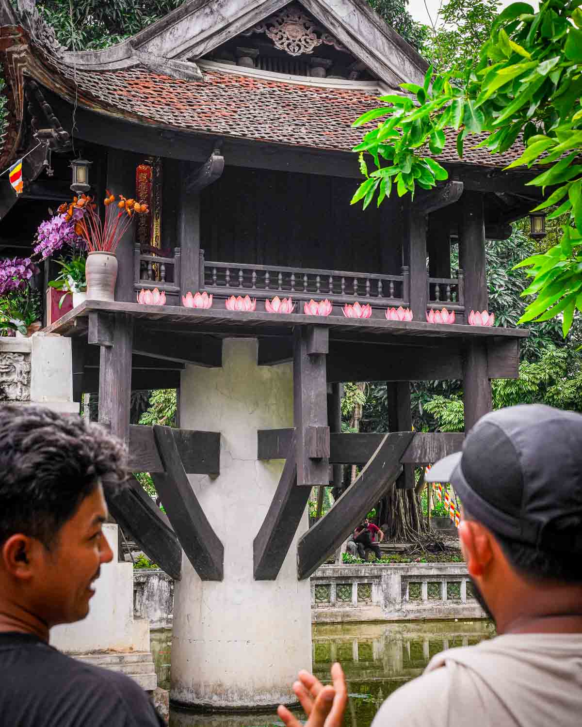 Guests looking at One Pillar Pagoda