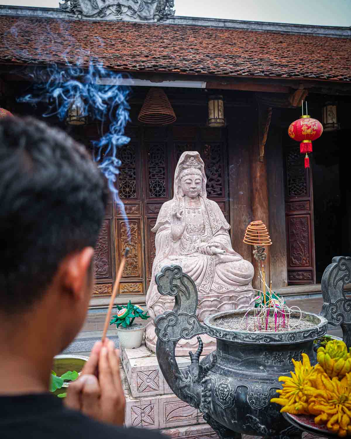 Local praying at a temple