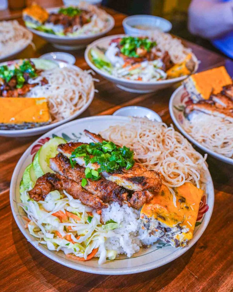 Table of rice bowls with grilled chicken