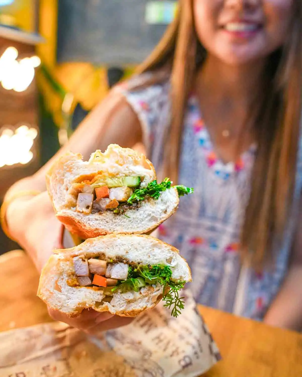 Guests holding Bahn Mi