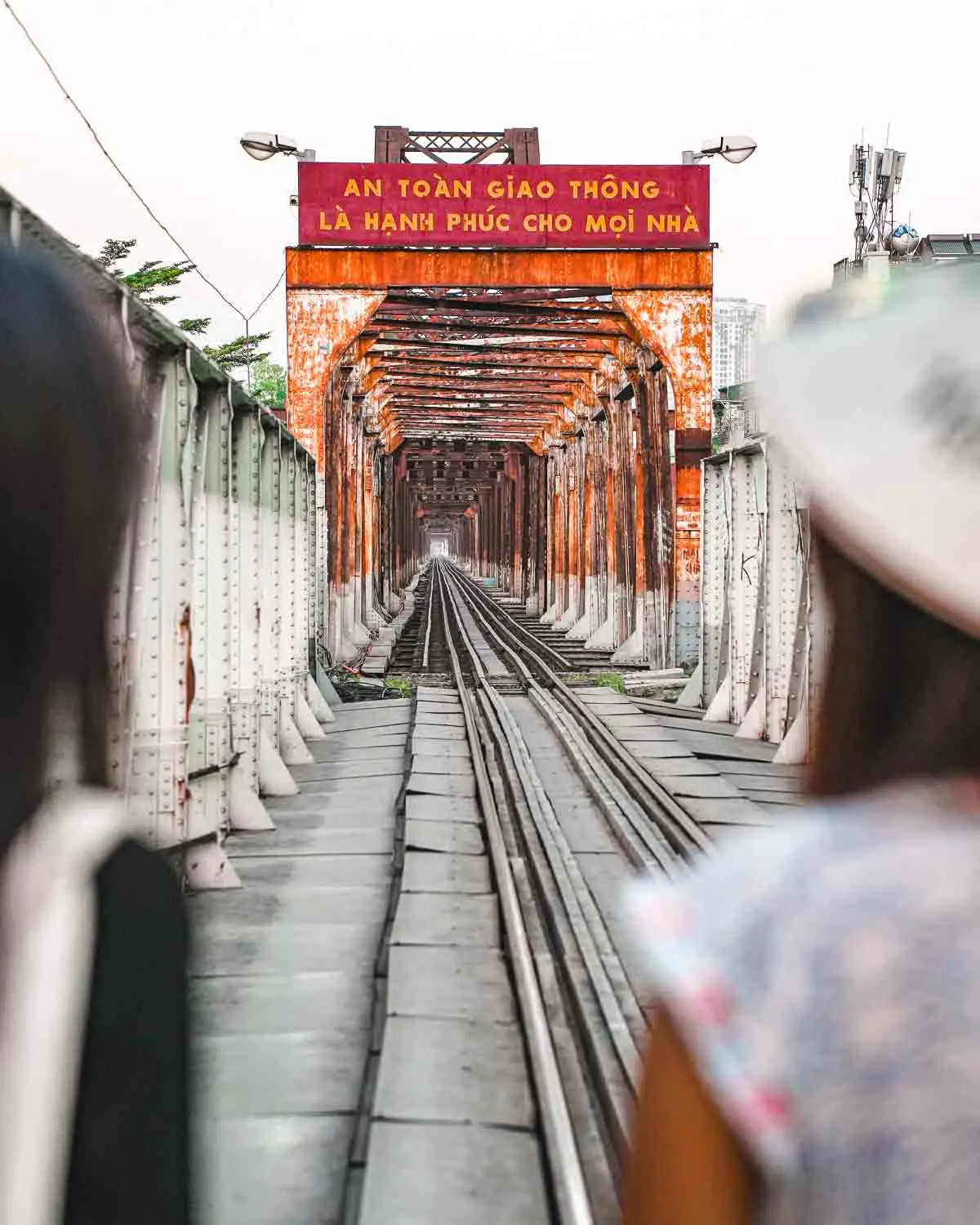 Guests looking at Long Bien Railway Bridge