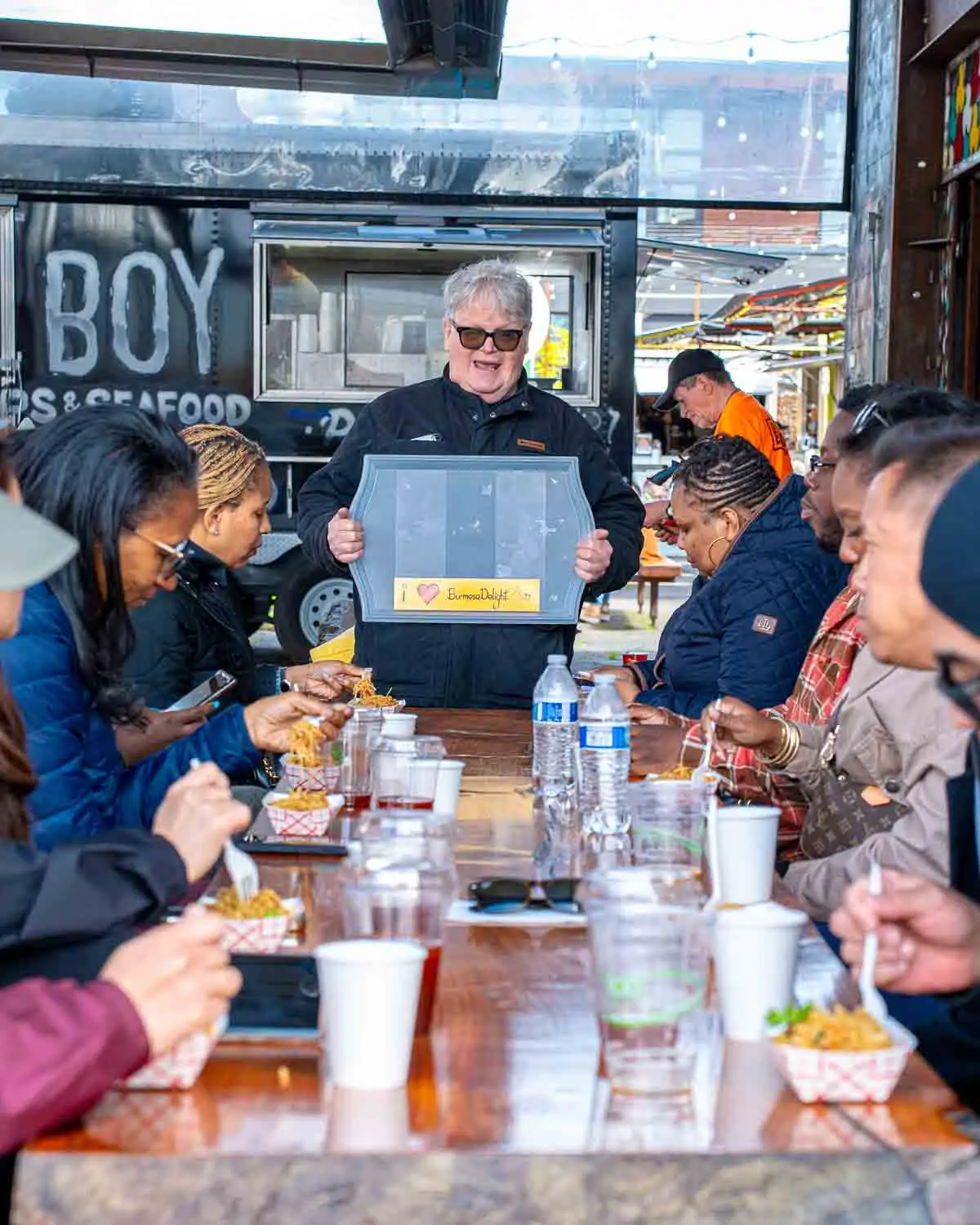 Group eating with guide