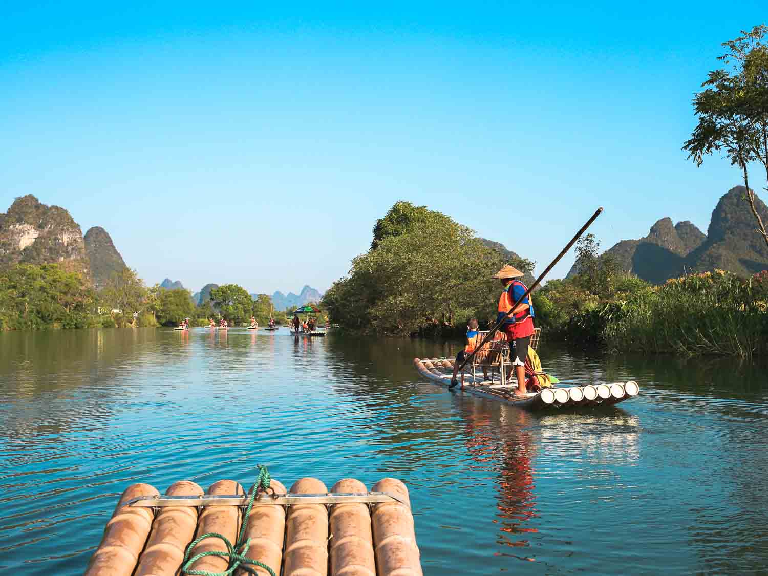 Bamboo rafting through karst mountains