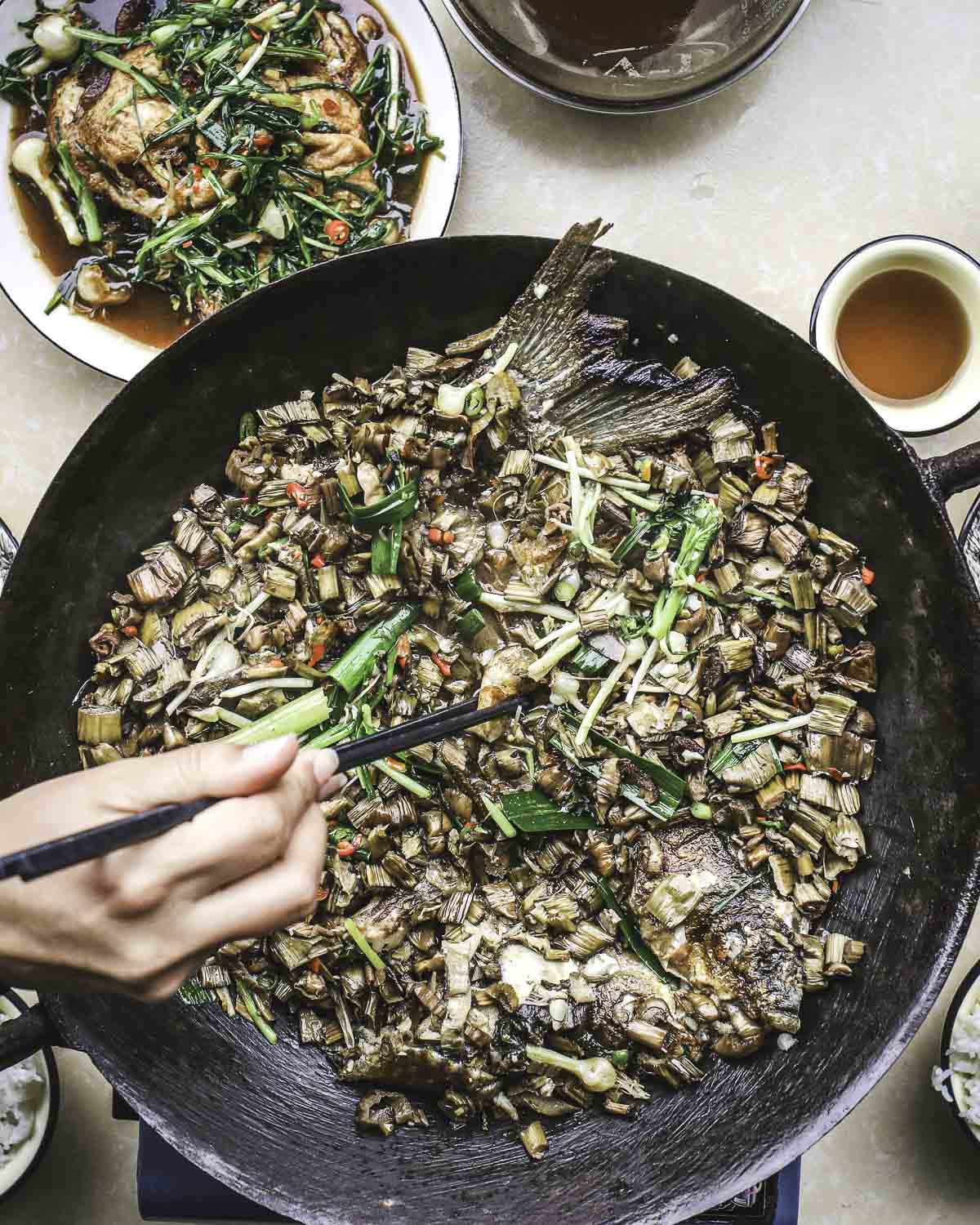 Giant wok of fried fish