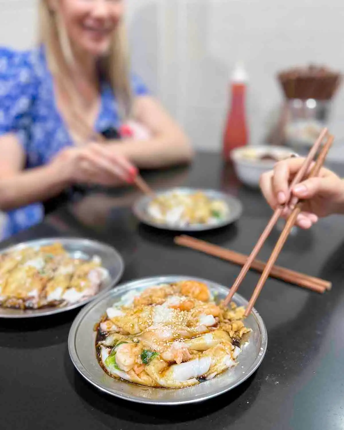 Plates of steamed rice rolls