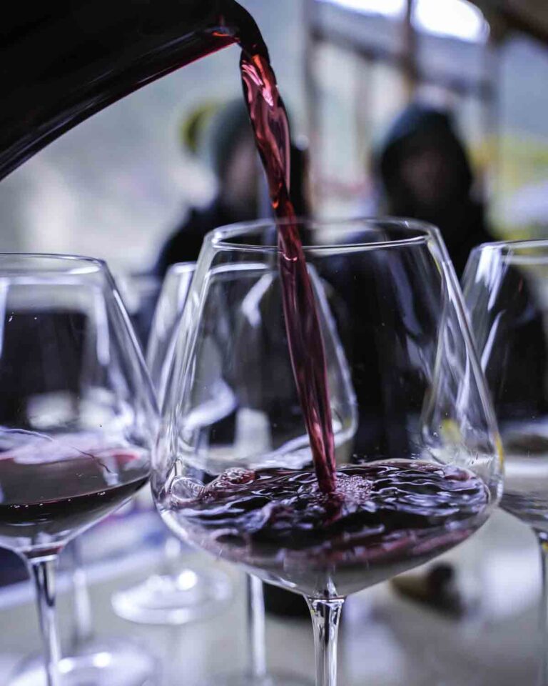 Pouring a glass of red wine