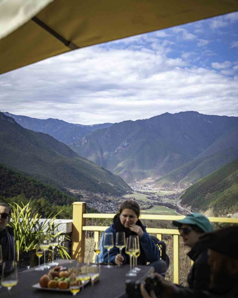 Drinking wine with a valley view