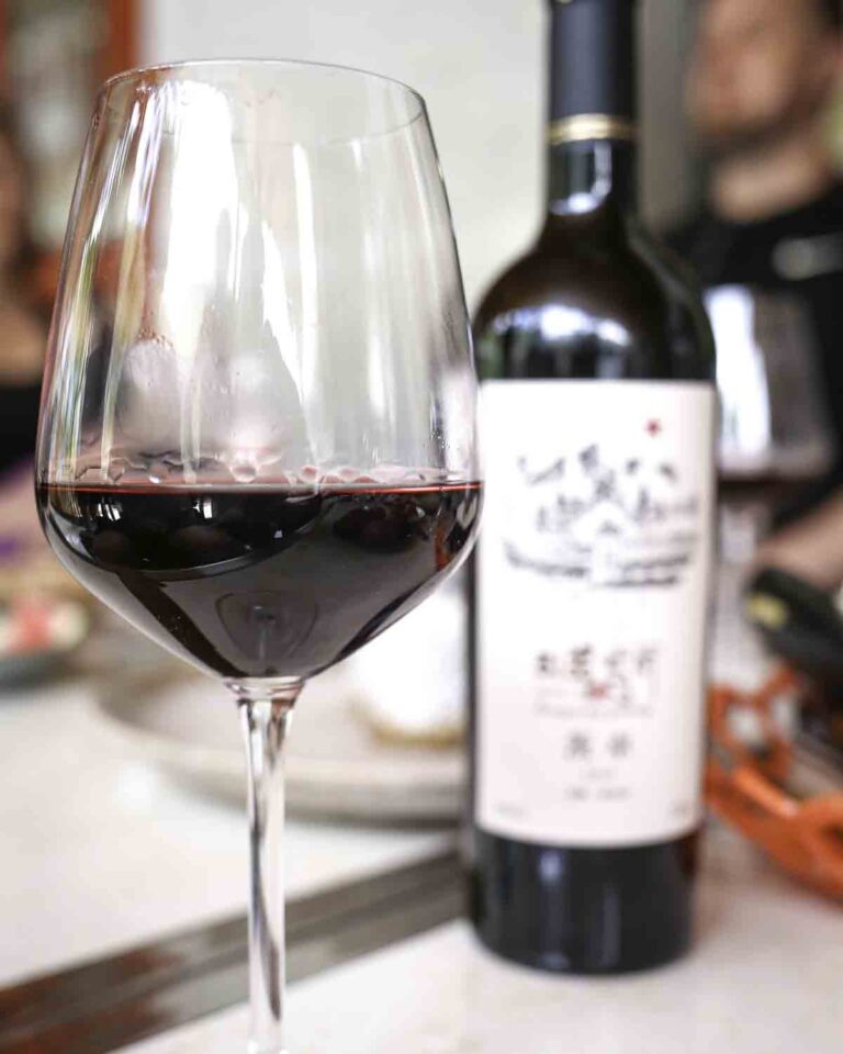 Local red wine bottle and glass