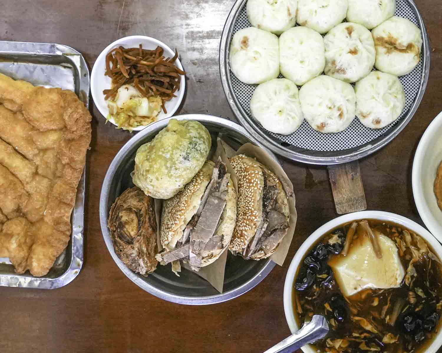 Table full of breakfast dishes