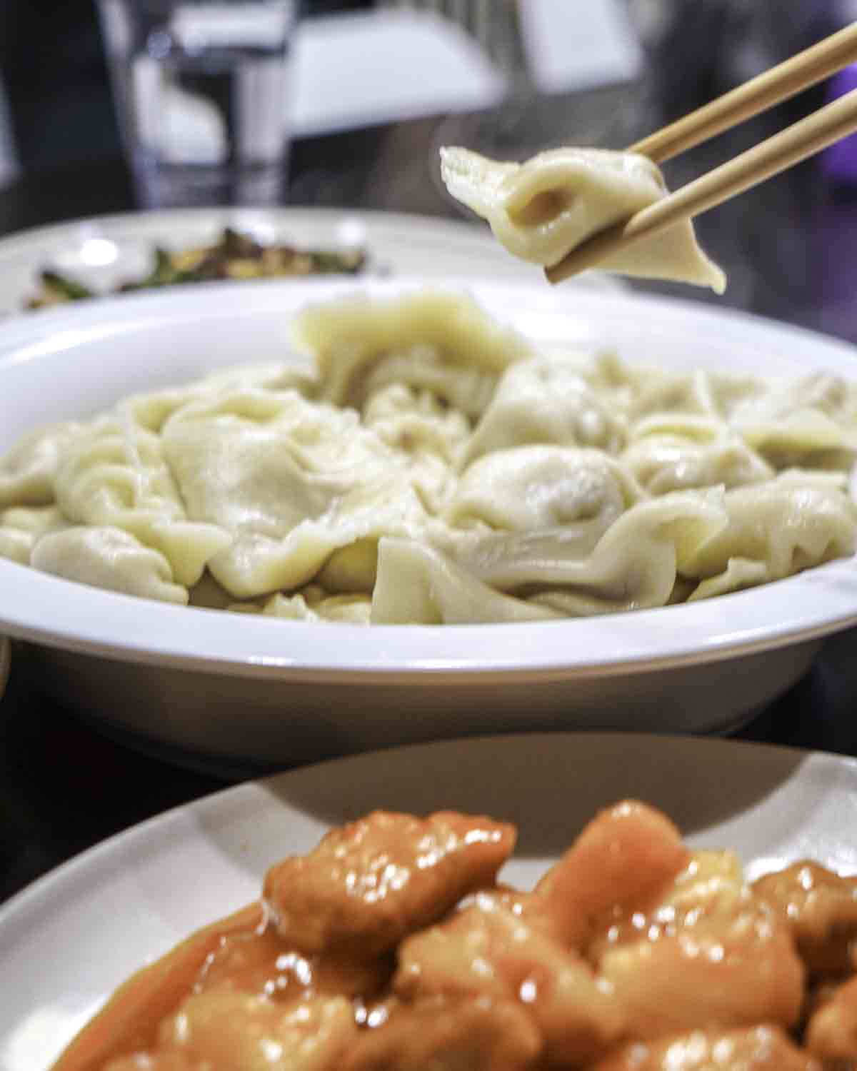 Eating dumplings at dinner