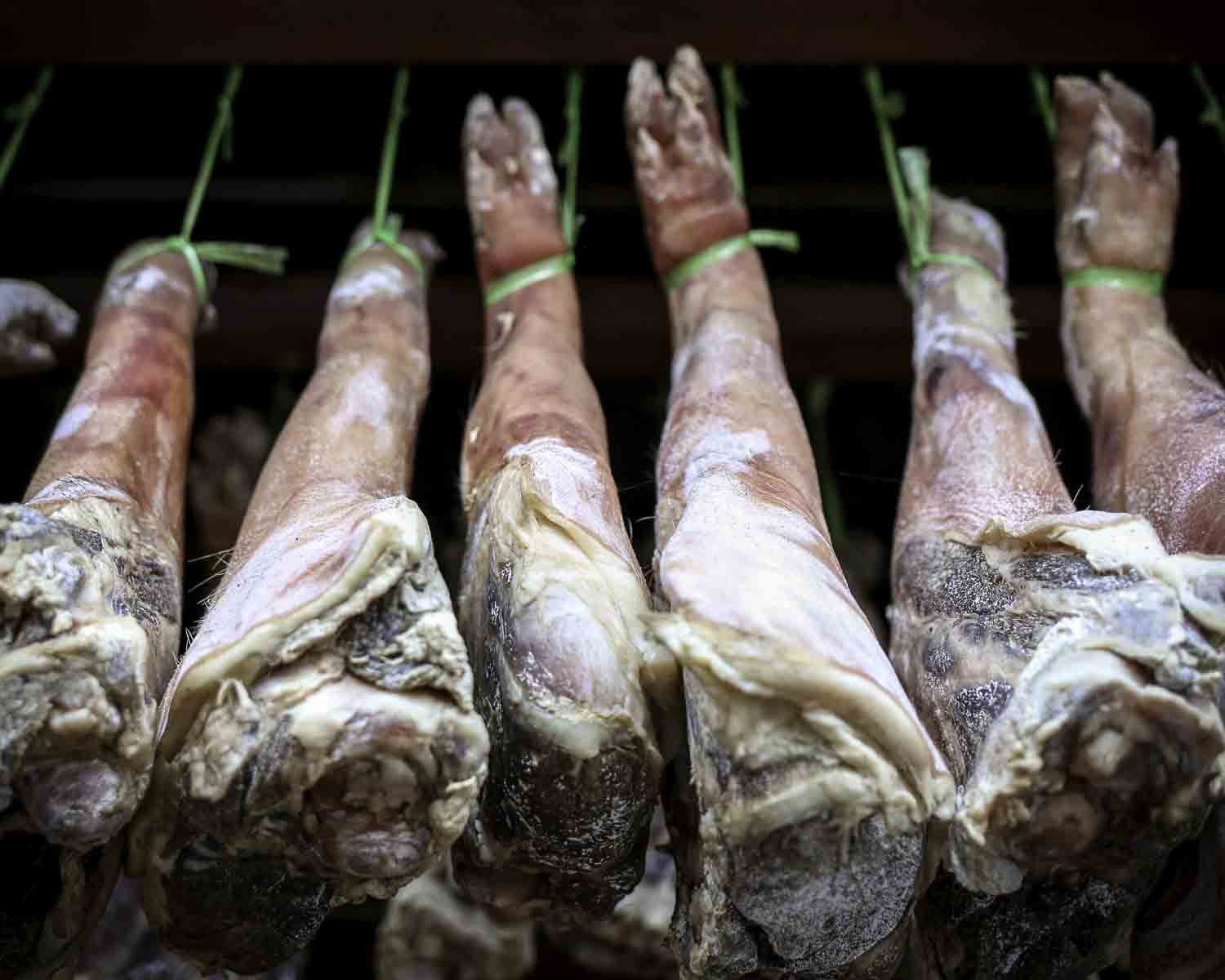 Hanging cured ham legs