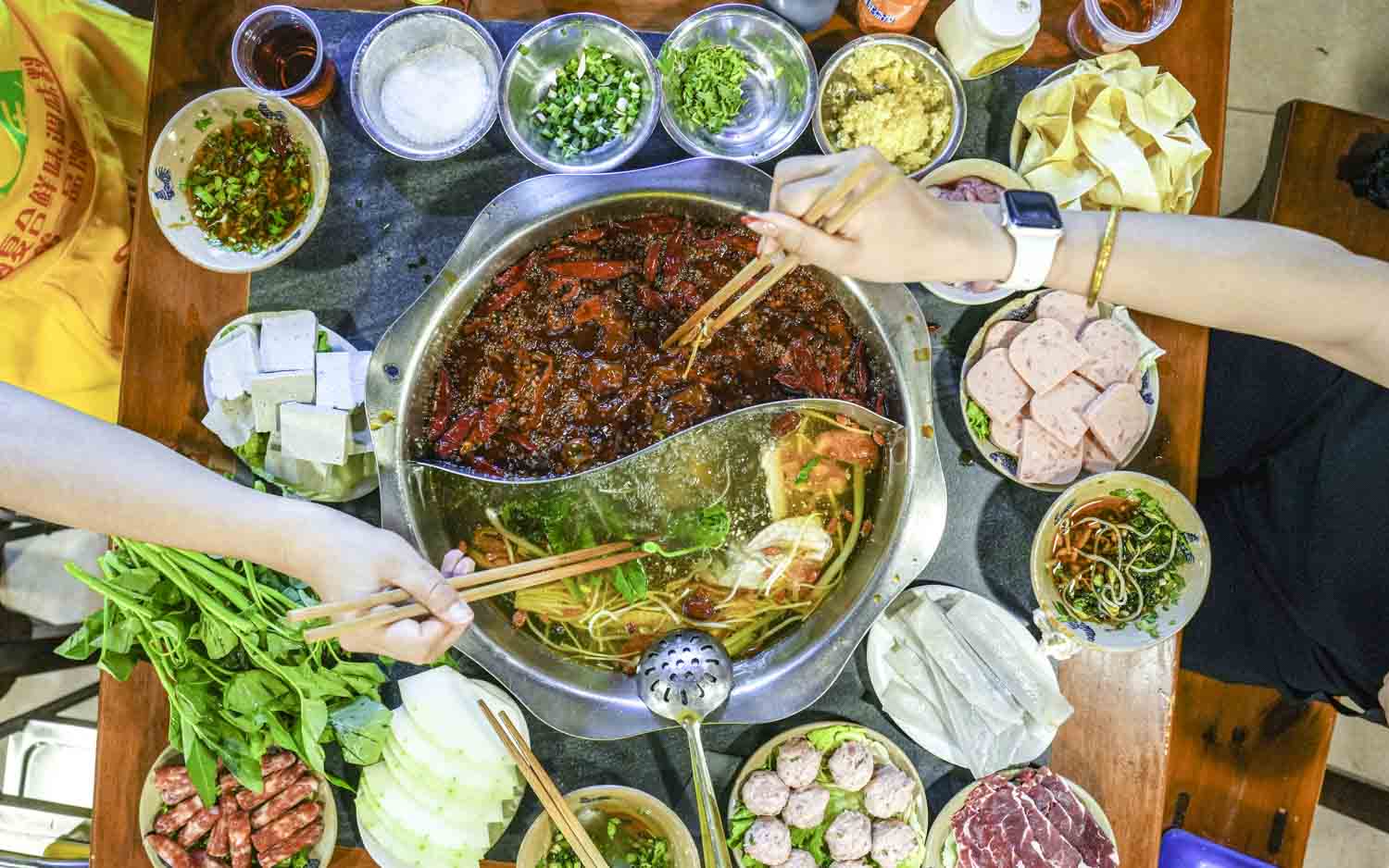 Hotpot table full of dishes