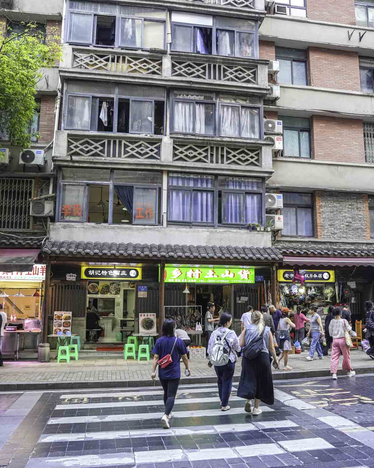Guests walking by residential building
