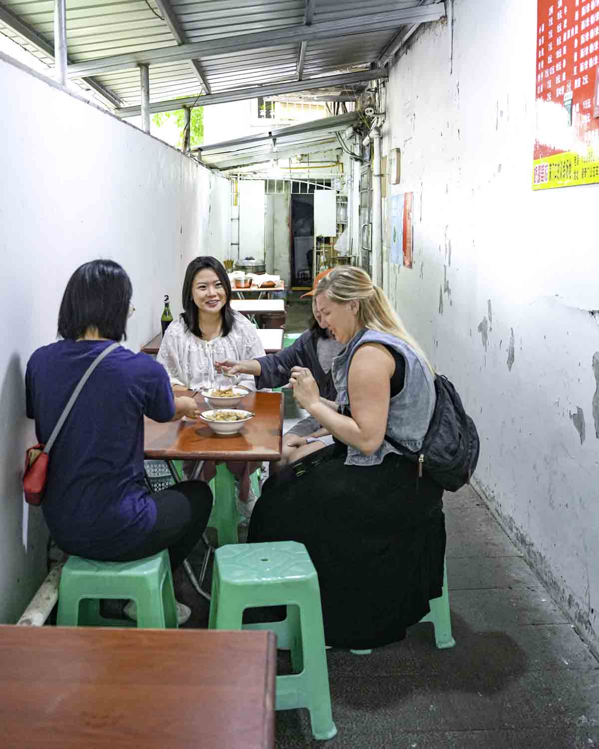 Guests eating in small restaurant