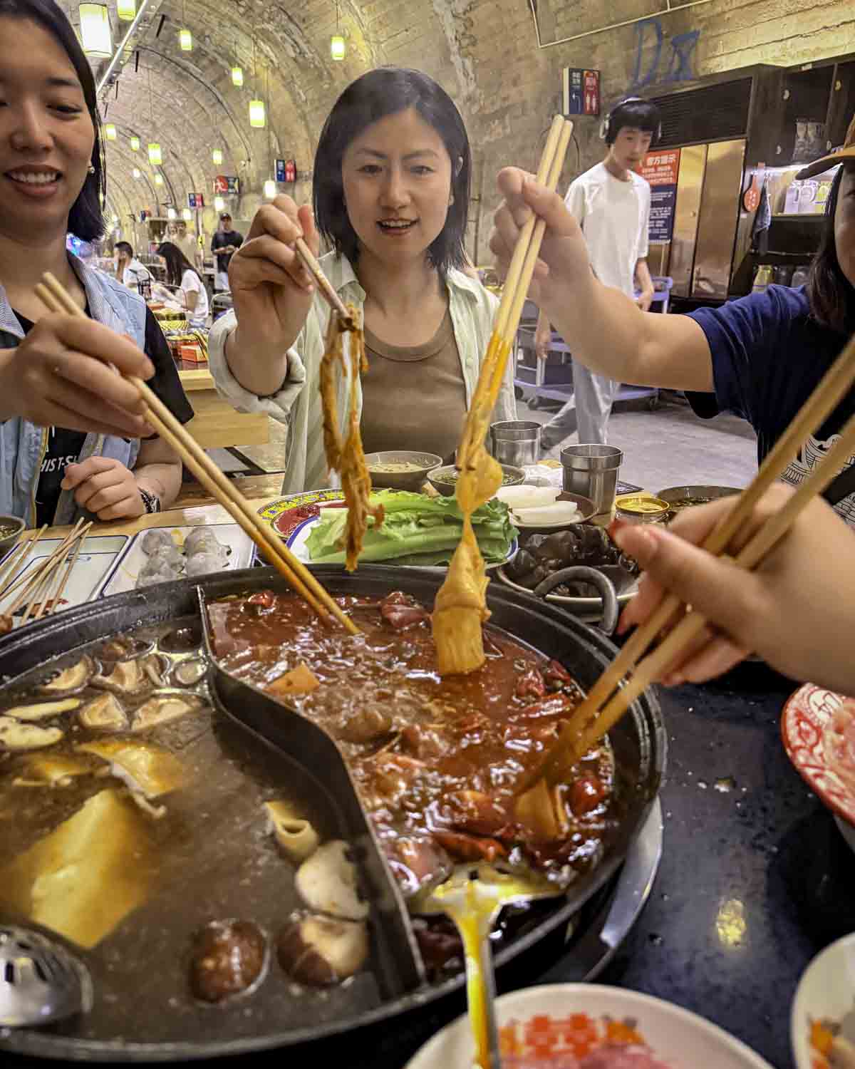Guests eating hotpot