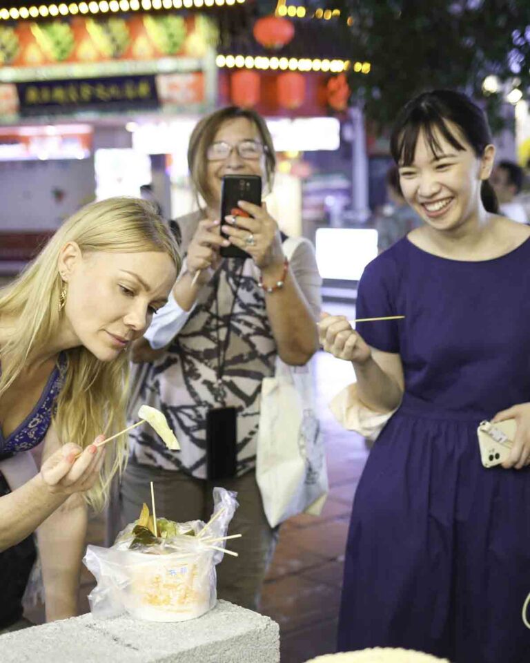 Guests eating street food