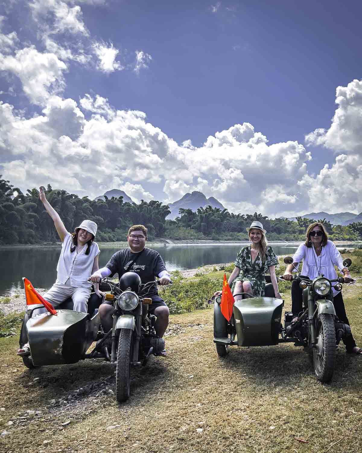 Riders on vintage sidecars with a view
